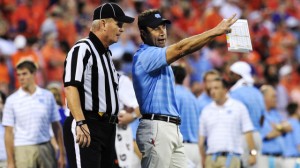 Larry Fedora talking to an official (UNC Athletics)