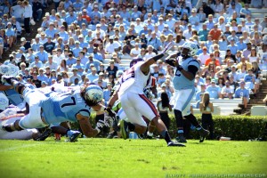 Carolina's offensive line had trouble protecting the QB. (Elliott Rubin)