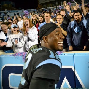 Marquise Williams celebrates with the Tar Pit after the win.