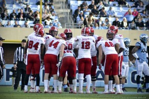 NC State huddle  (Elliott Rubin)