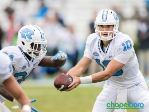 Mitch Trubisky (10) hands off to Romar Morris (21). Photo by Smith Cameron Photography.