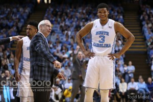 Roy Williams giving Kennedy Meeks some advice on the sideline in his first game since having a vertigo spell at Boston College. (Todd Melet)