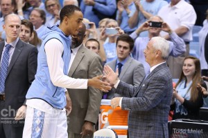 Brice Johnson and Roy Williams embrace one another before the game. (Todd Melet)