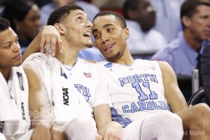 A couple of Tar Heel teammates, Justin Jackson (left) and Brice Johnson (right) share a laugh on the bench late in Saturday's game. (Todd Melet)