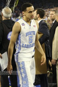Marcus Paige walks off the court after Jenkins' shot. (Todd Melet)