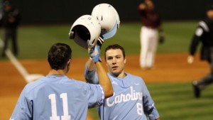 Kyle Datres (right) celebrates his first career home run with catcher Cody Roberts (left). (Joe Bray/ UNC Athletics)