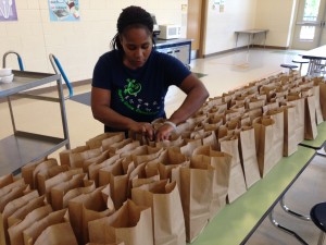 Essie Markham packs lunches at Northside Elementary School (Photo by Chris Grunert)