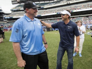 Joe Breschi (left) and Larry Fedora (right) spoke prior to Monday's championship game against Maryland. A number of UNC coaches voiced their support for both the men's and women's lacrosse teams over the weekend. (Jeffrey A. Camarati/ UNC Athletics)