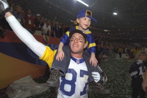 Ricky Proehl with Austin on his shoulders after the St. Louis Rams' Super Bowl XXXIV victory over the Tennessee Titans. (Photo by Albert Dickson/Sporting News via Getty Images)