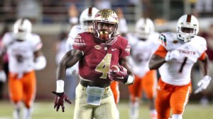 Florida State tailback Dalvin Cook is the type of player who can make great defenses look bad. He currently ranks eighth in the nation in total rushing yards this season. (Stephen M. Dowell/ Getty Images)