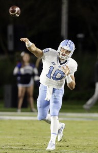 UNC quarterback Mitch Trubisky (10) threw for three touchdowns against Duke on Thursday, but his two second-half interceptions helped the Blue Devils score the upset win. (AP Photo/Gerry Broome)