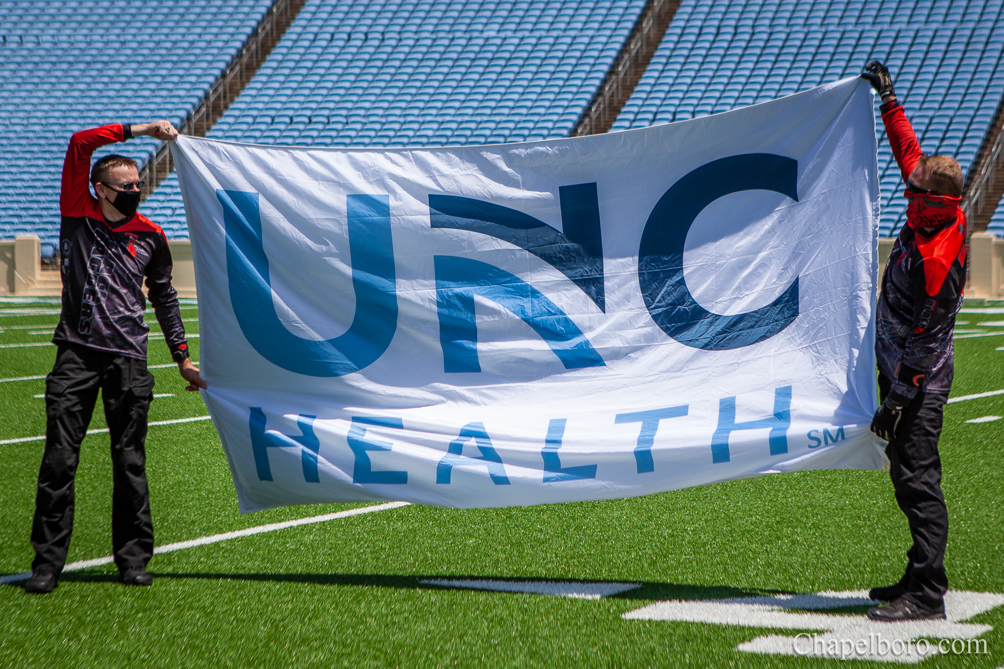 Photo Gallery: Parachute Team Jumps Into Kenan Stadium to Honor UNC Health Workers