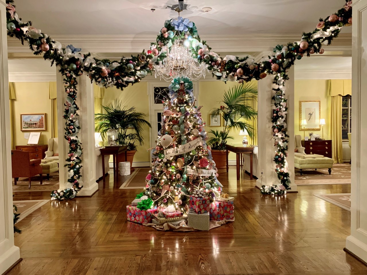 Holiday Tree Toppers Adding Final Touches to Modern Christmas Tree