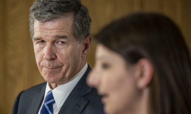 Cooper Ends Suit Challenging Powerful NC Rules Panel
