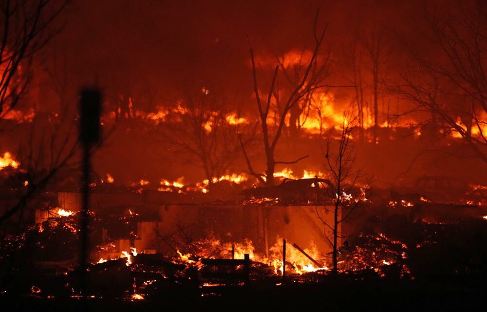 Thousands Flee as Colorado Wildfires Burn Hundreds of Homes