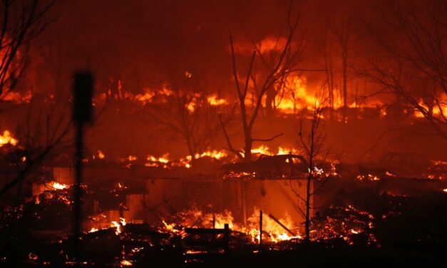 Thousands Flee as Colorado Wildfires Burn Hundreds of Homes
