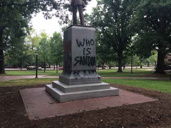 “Who is Sandra Bland?” Spray Painted on Silent Sam