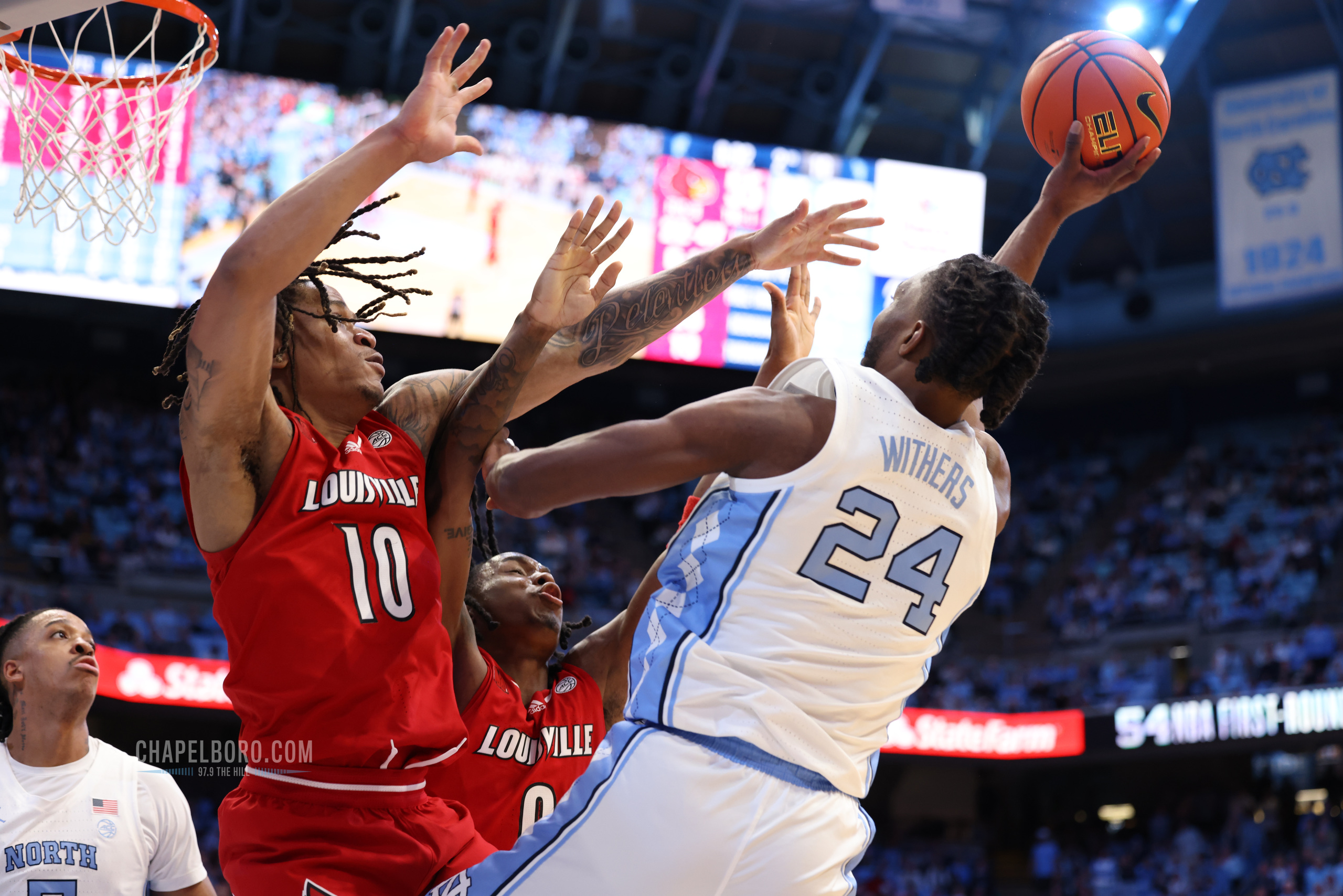 UNC Men's Basketball Fights Off Louisville's 2ndHalf Rally to Win 7th