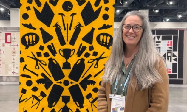 Ginny Robinson’s Award-Winning Quilt “School Supplies” Grapples With the Pervasive Threat of Gun Violence in American Schools