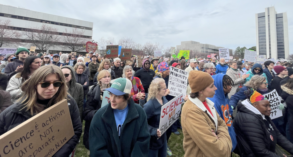 Hundreds March in Raleigh Against Cuts in Federal Funding for Scientific Research