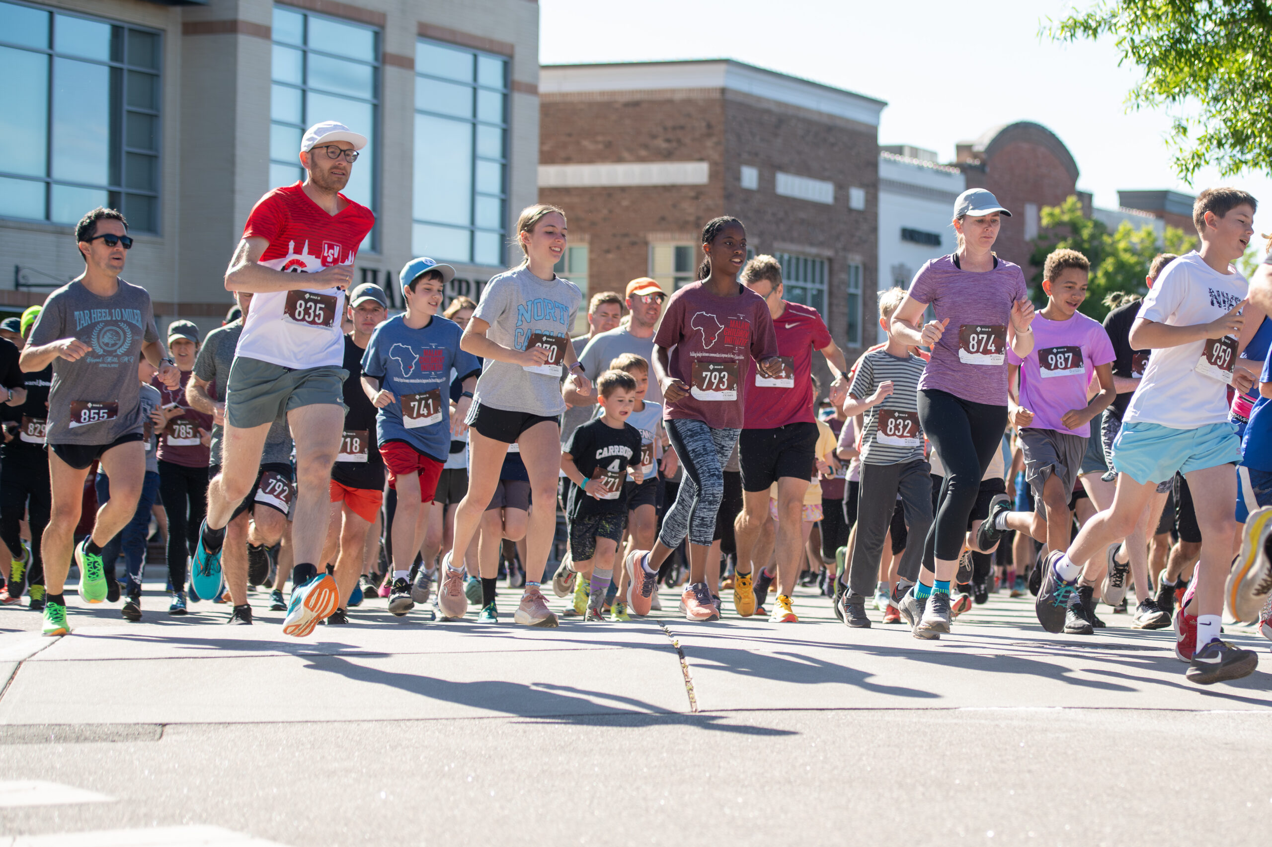 close up of runners with MCI shirt
