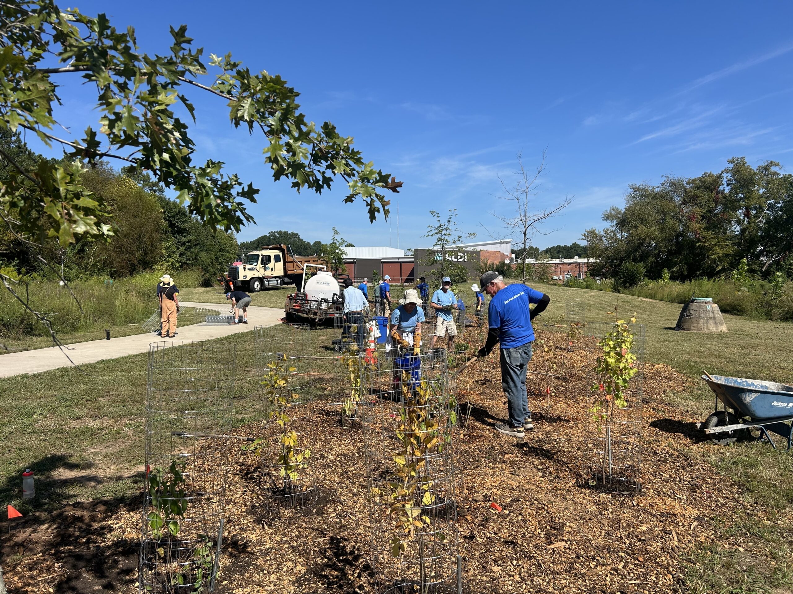 Local Groups Beautify Lower Booker Creek Trail, Aim to Combat Floodwater with Native Tree Plantings